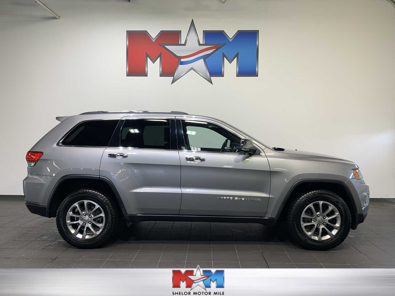 used 2015 Jeep Grand Cherokee car, priced at $21,489