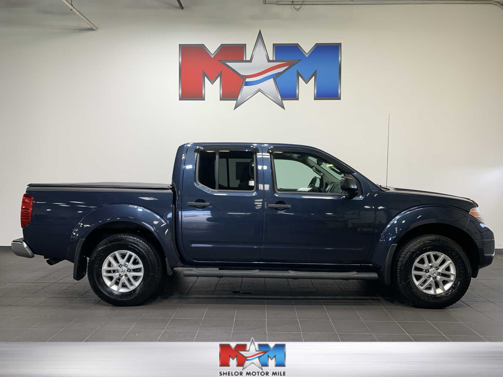 used 2015 Nissan Frontier car, priced at $21,985