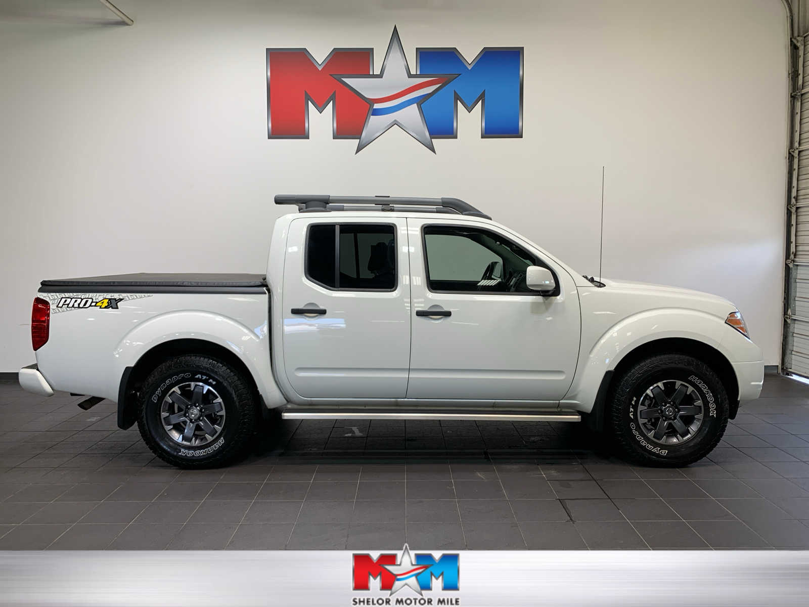 used 2021 Nissan Frontier car, priced at $33,987