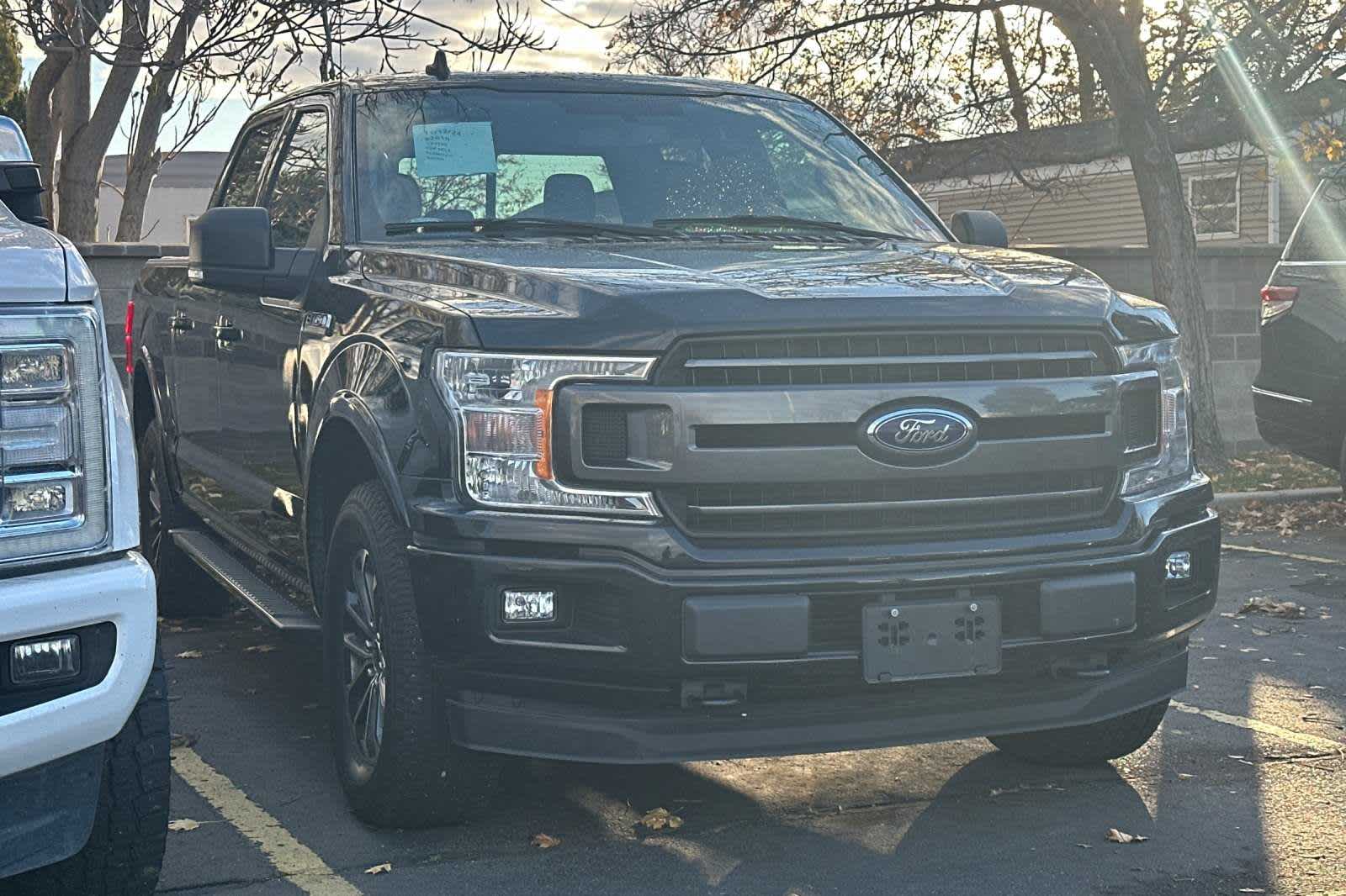 used 2018 Ford F-150 car, priced at $26,995