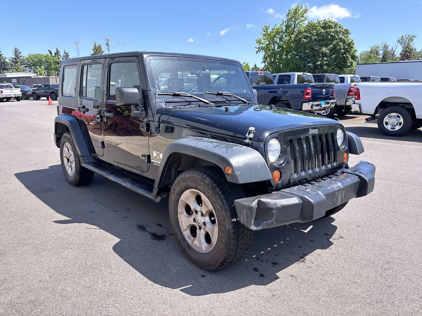 used 2009 Jeep Wrangler Unlimited car, priced at $16,990