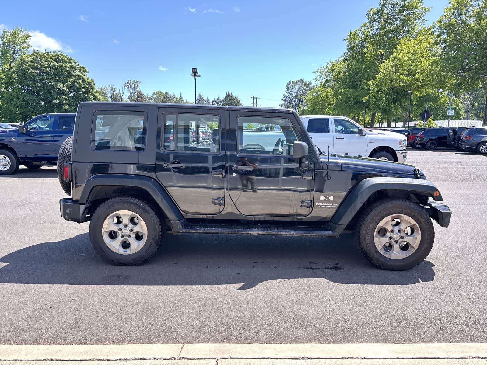 used 2009 Jeep Wrangler Unlimited car, priced at $16,990