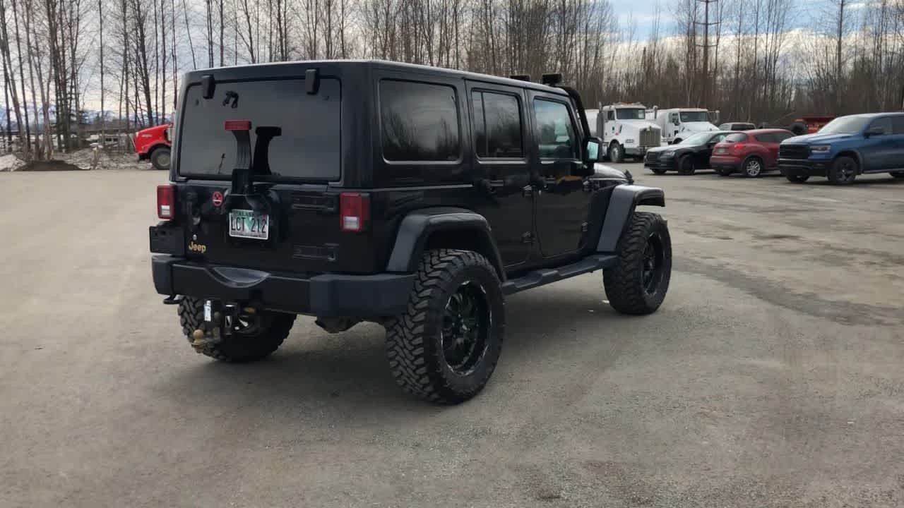 used 2014 Jeep Wrangler Unlimited car, priced at $24,990