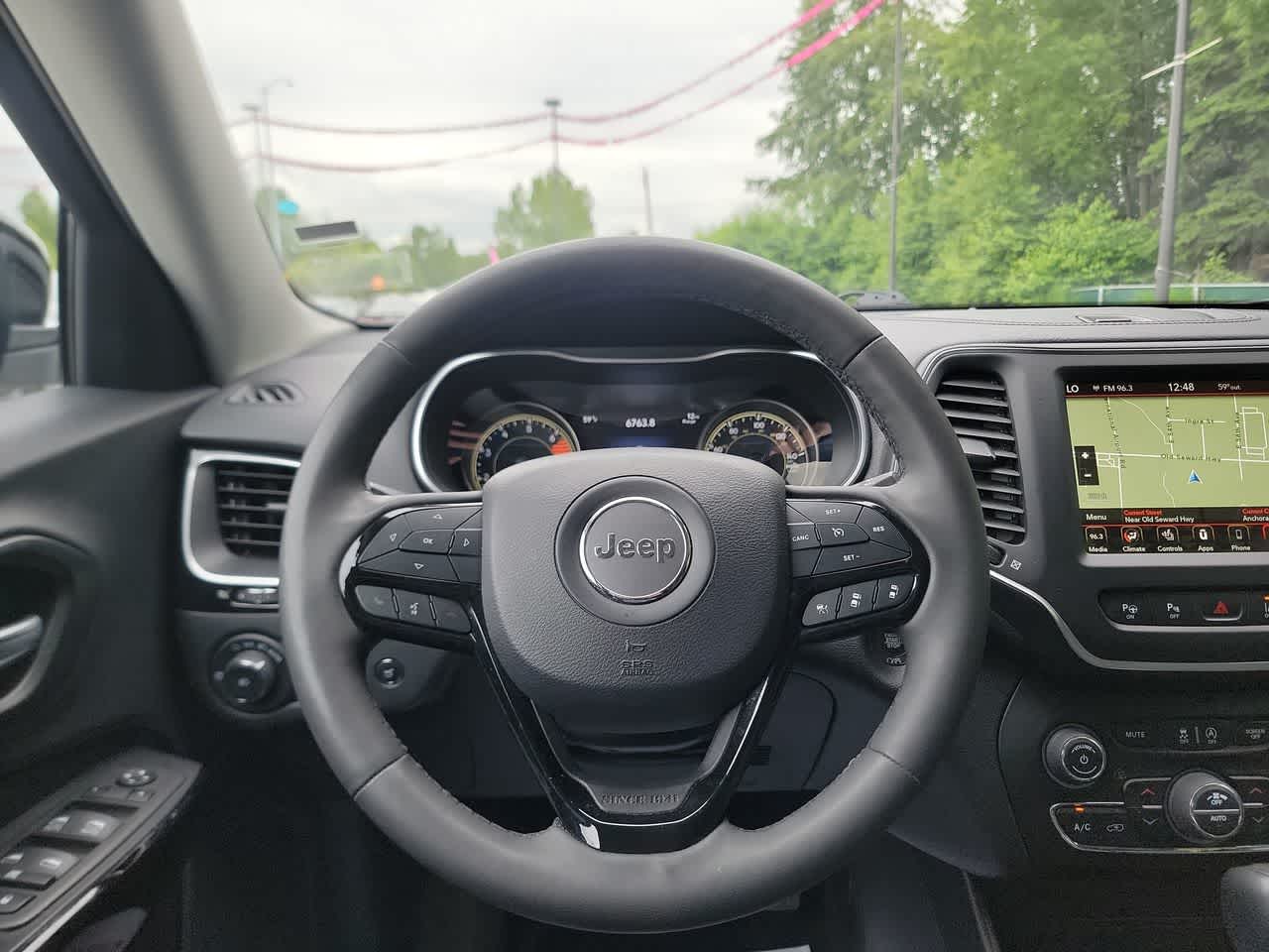 used 2023 Jeep Cherokee car, priced at $24,995