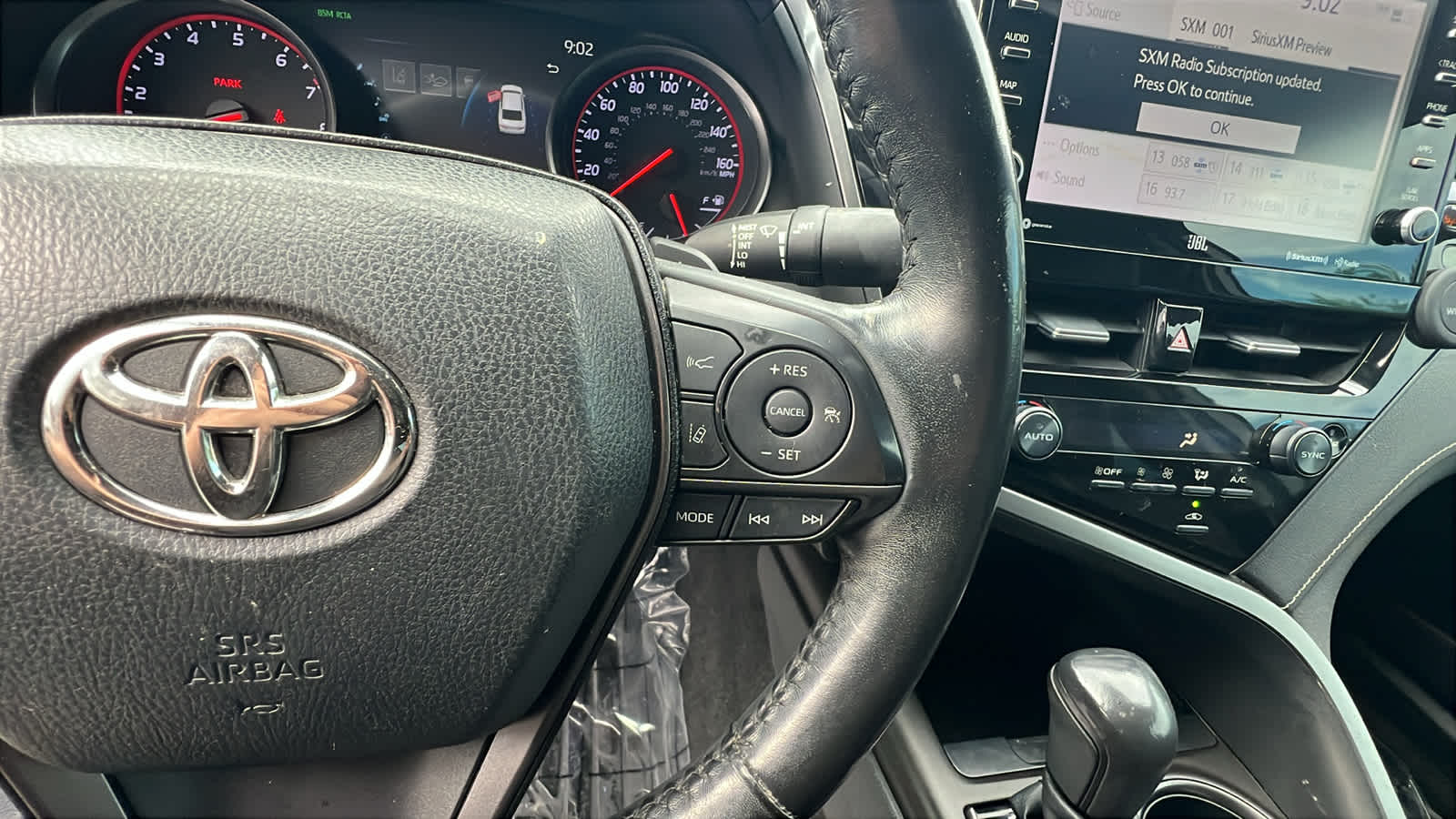 used 2021 Toyota Camry car, priced at $22,995