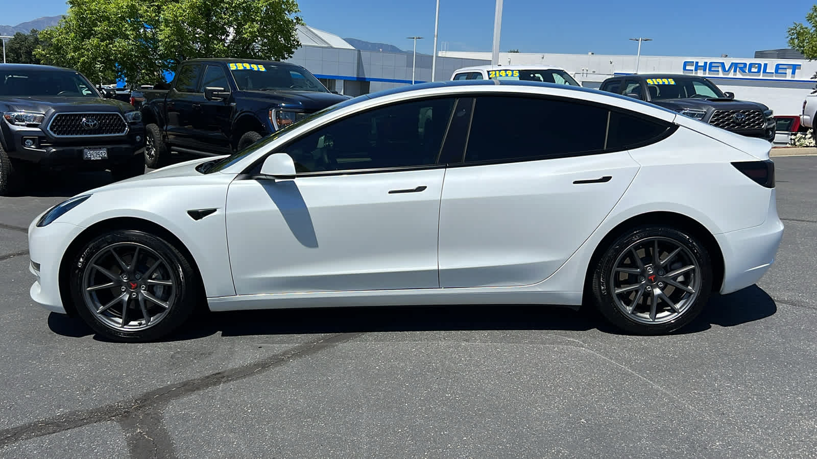 used 2023 Tesla Model 3 car, priced at $25,495