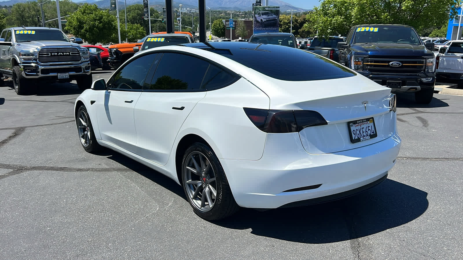 used 2023 Tesla Model 3 car, priced at $25,495