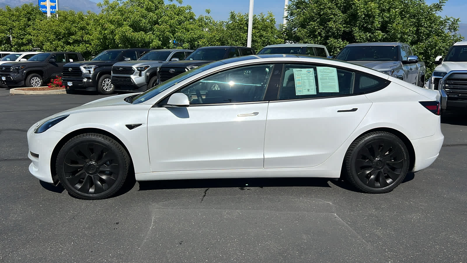 used 2022 Tesla Model 3 car, priced at $26,995