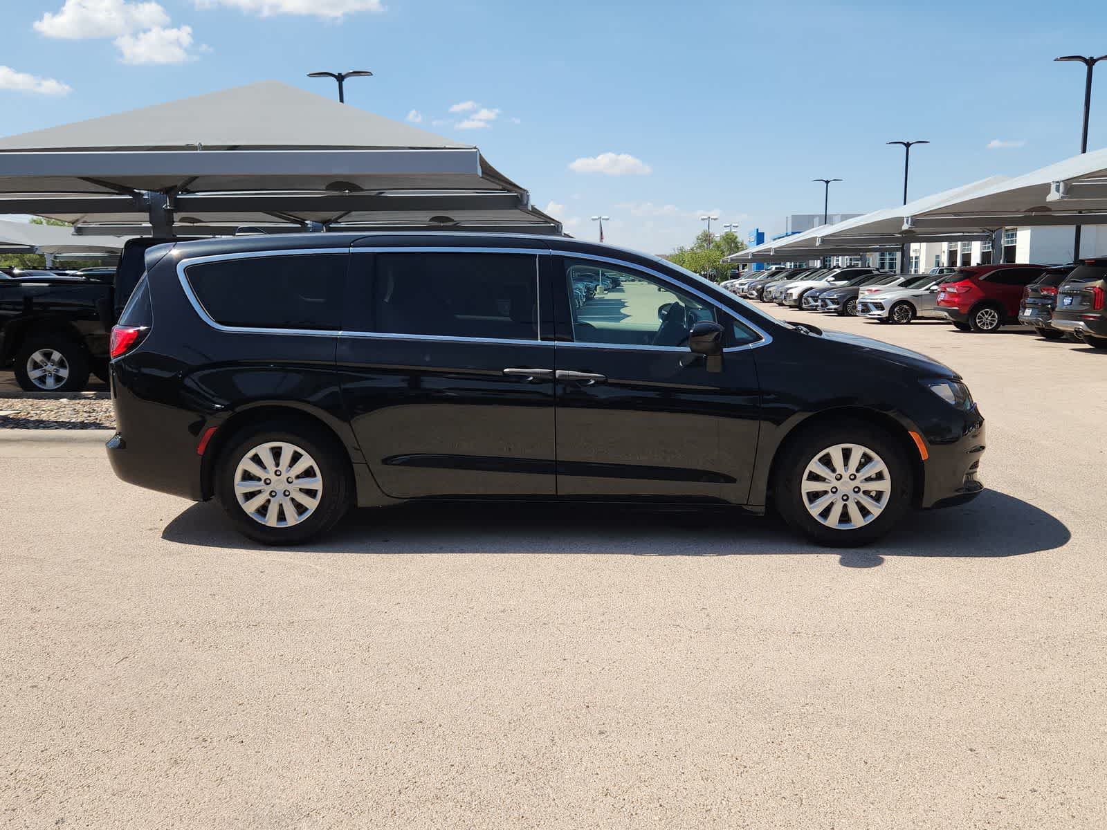 used 2021 Chrysler Voyager car, priced at $14,999