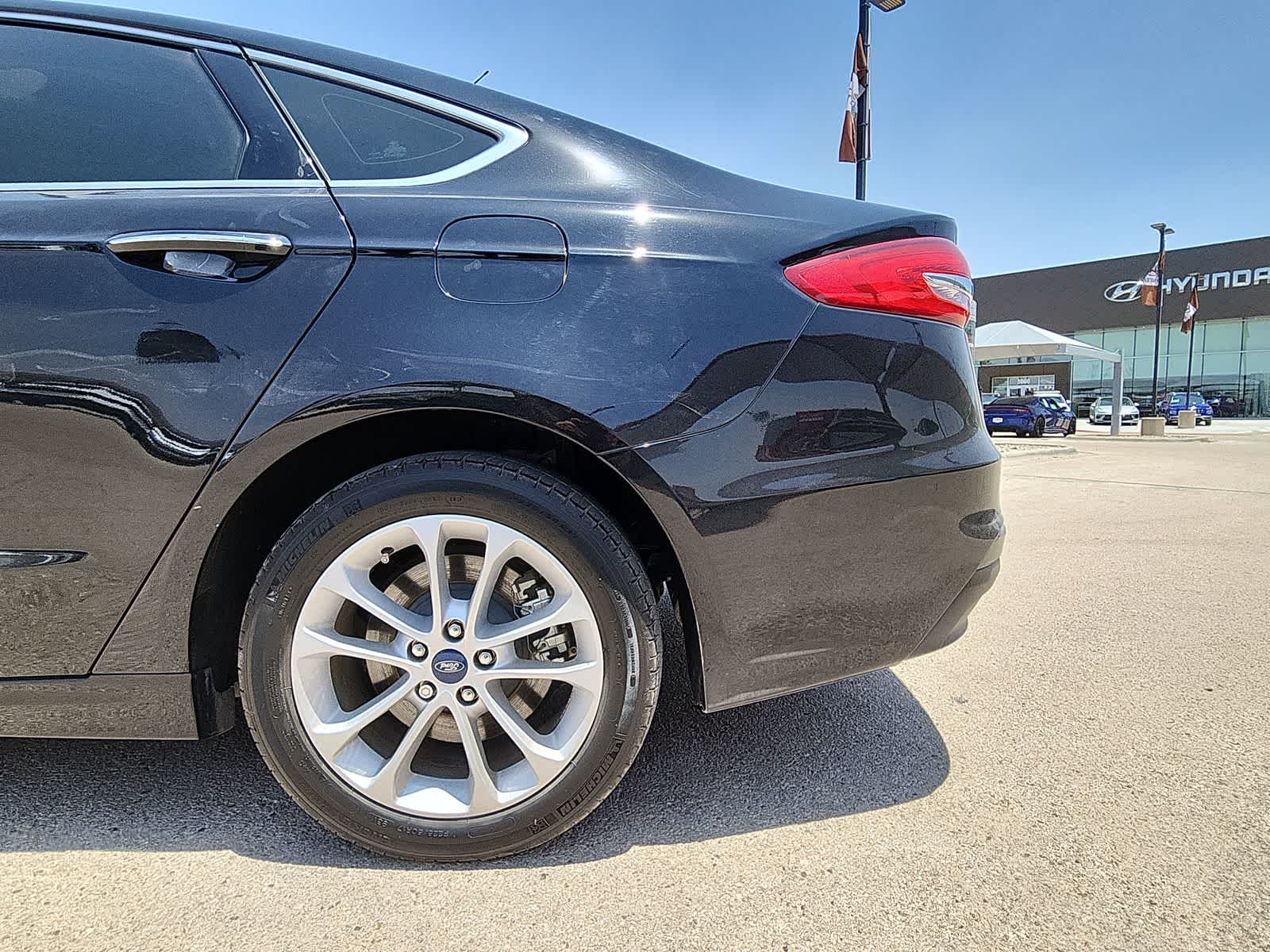 used 2020 Ford Fusion Plug-In Hybrid car, priced at $24,999