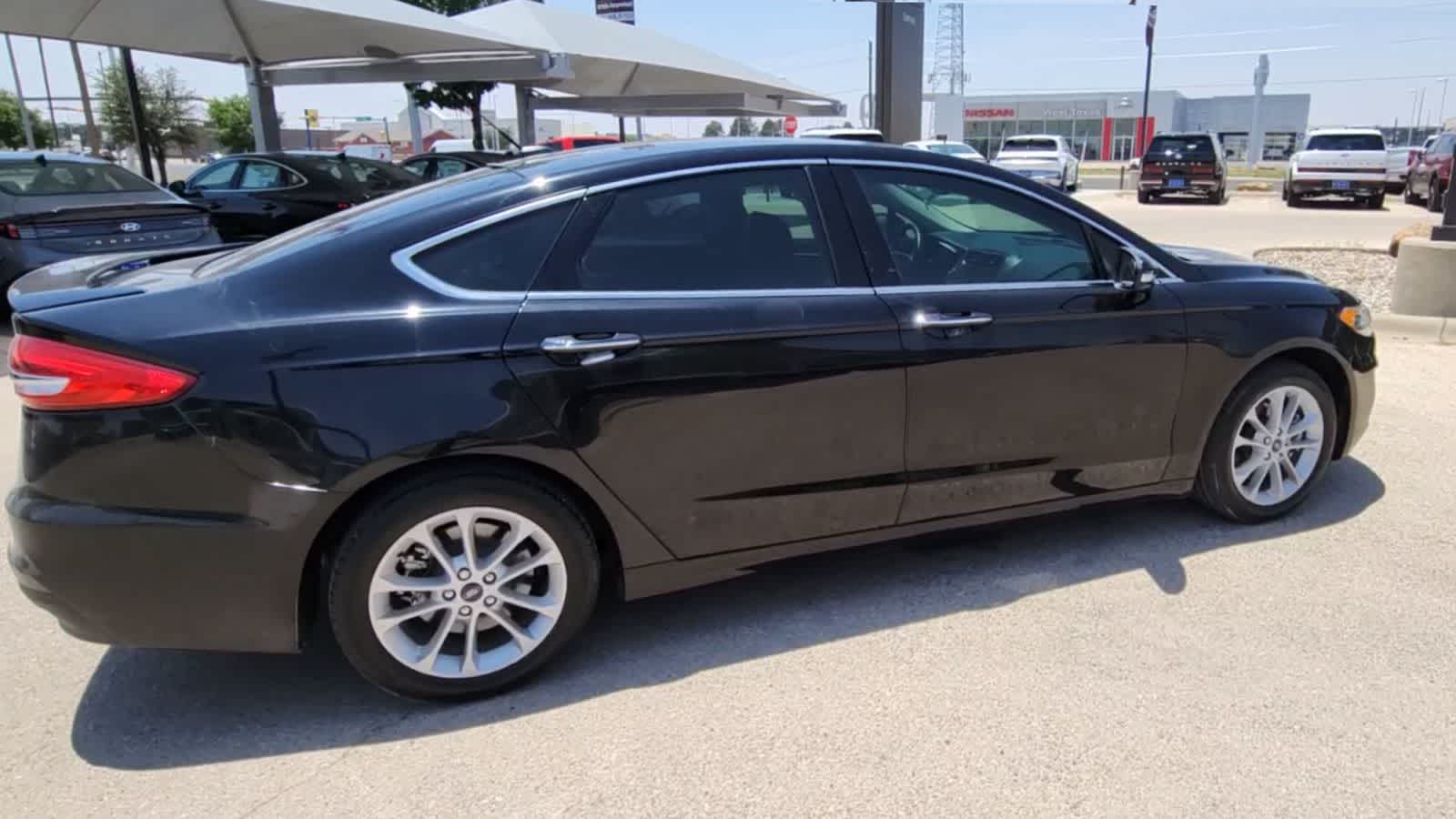 used 2020 Ford Fusion Plug-In Hybrid car, priced at $24,999