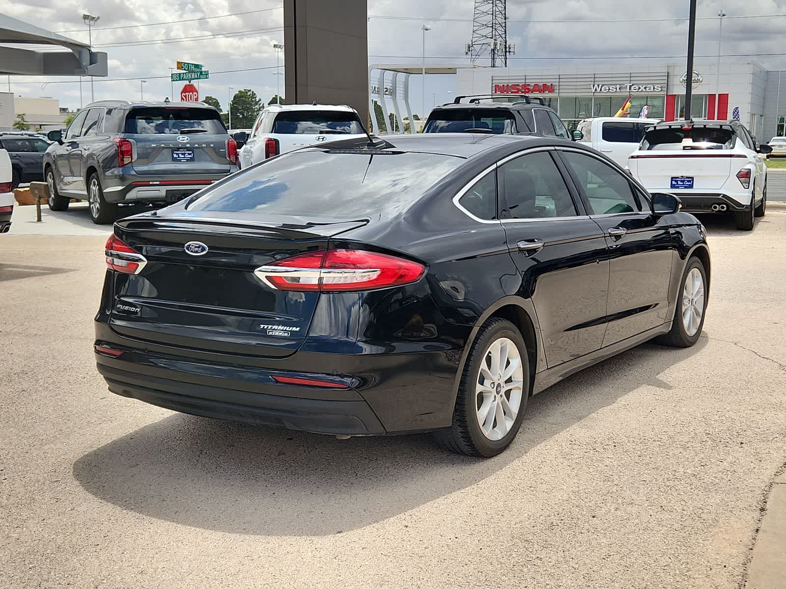 used 2020 Ford Fusion Plug-In Hybrid car, priced at $24,999