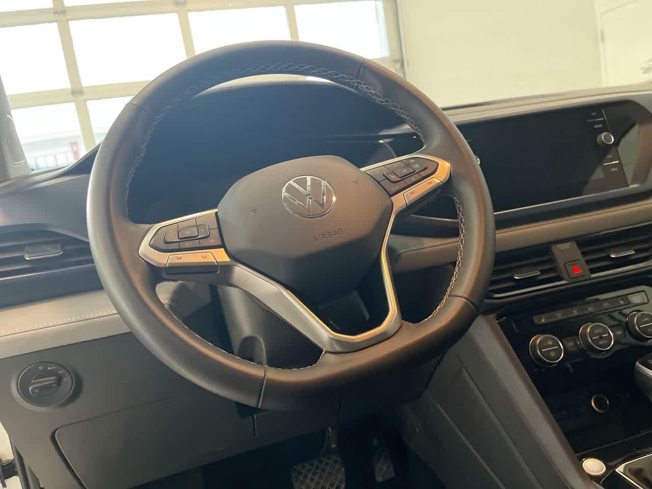 used 2024 Volkswagen Taos car, priced at $22,945