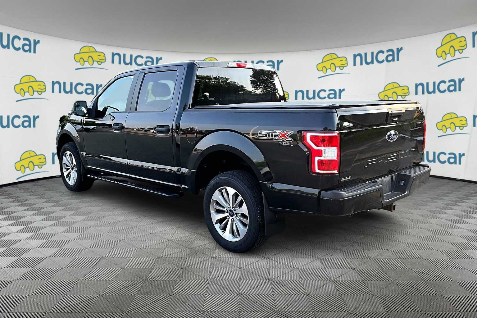 used 2018 Ford F-150 car, priced at $22,988