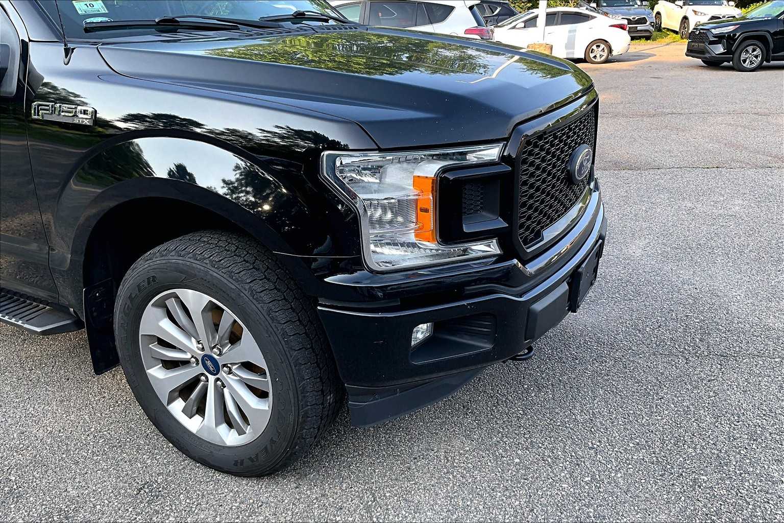 used 2018 Ford F-150 car, priced at $22,988