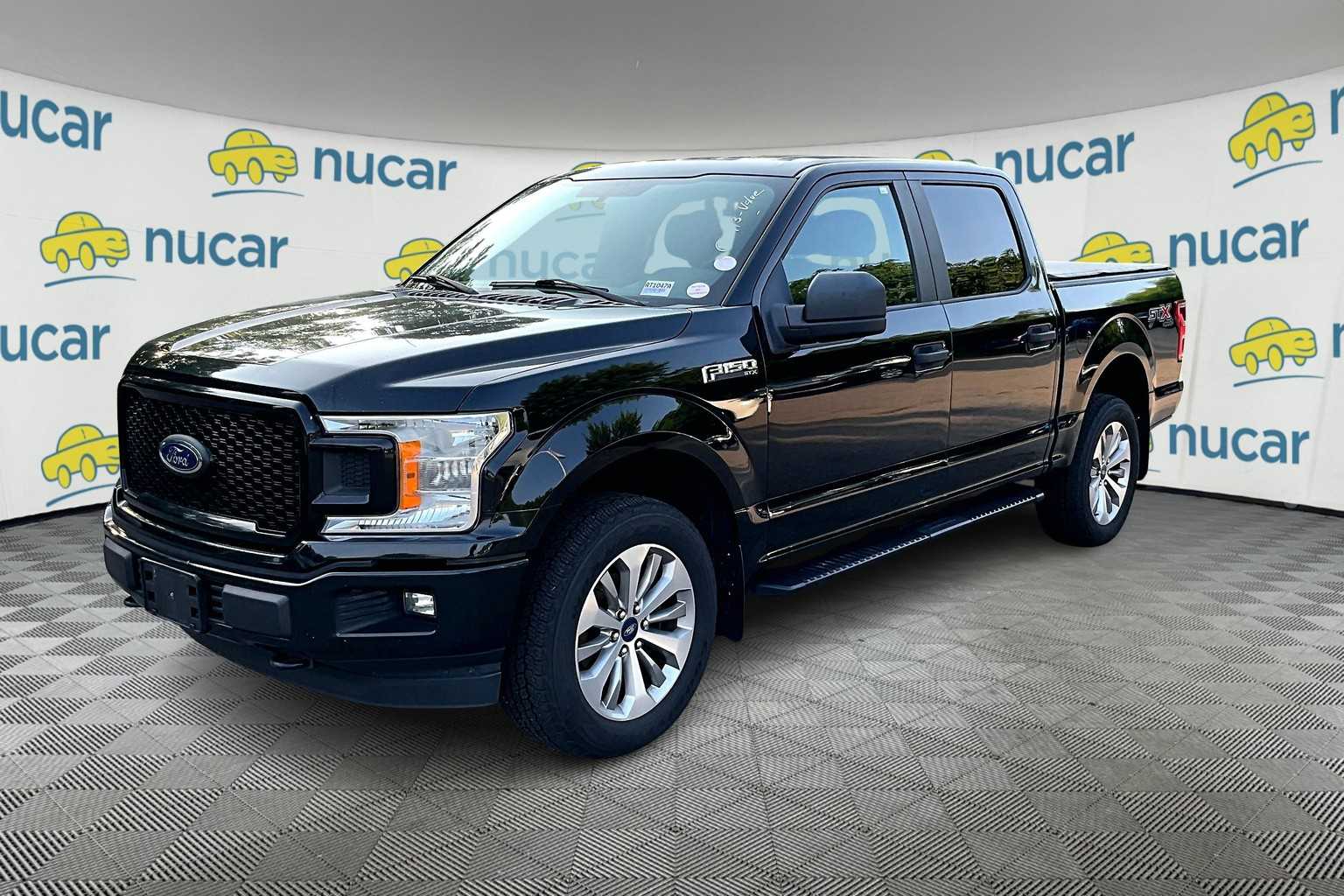 used 2018 Ford F-150 car, priced at $22,988