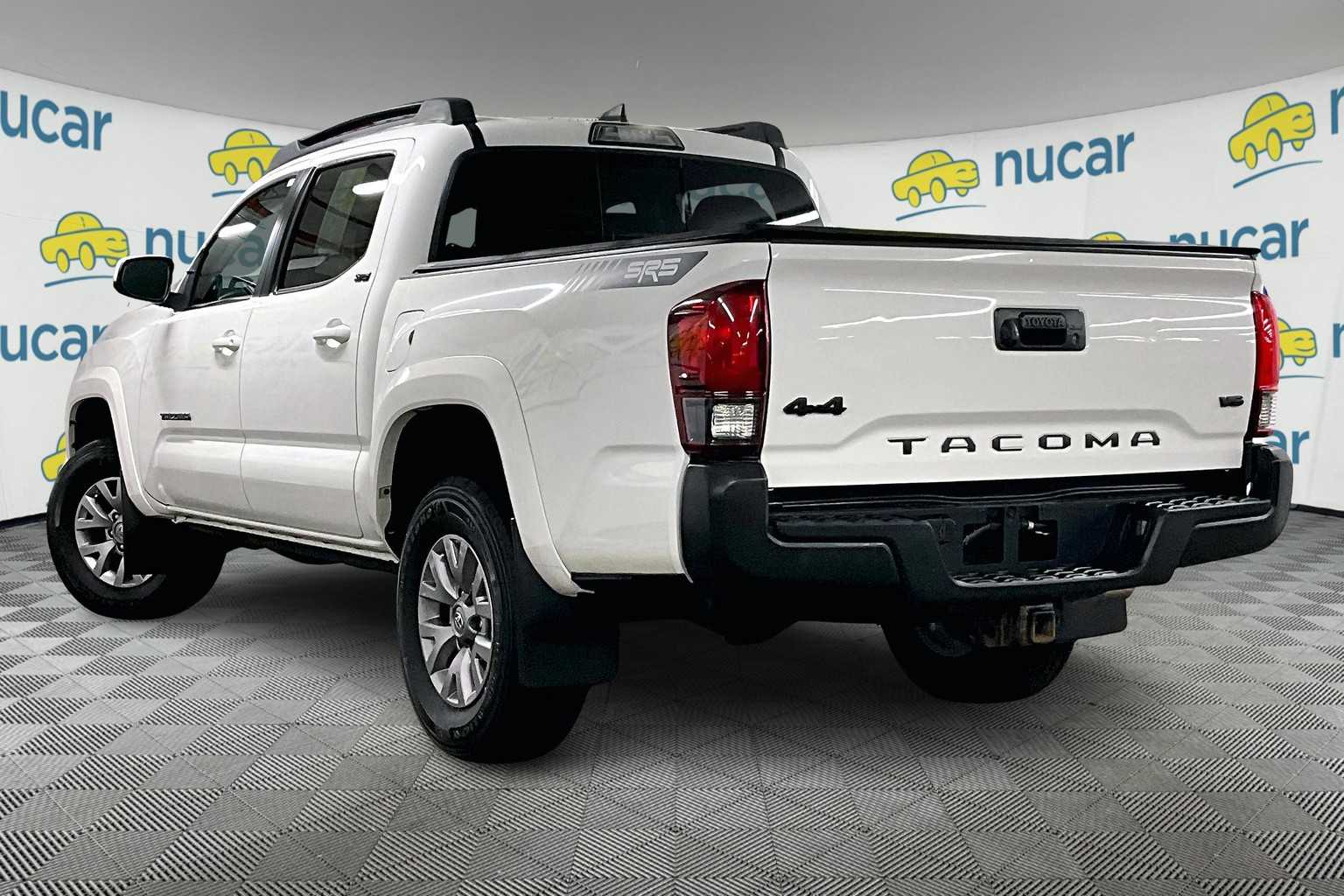 used 2018 Toyota Tacoma car, priced at $27,588