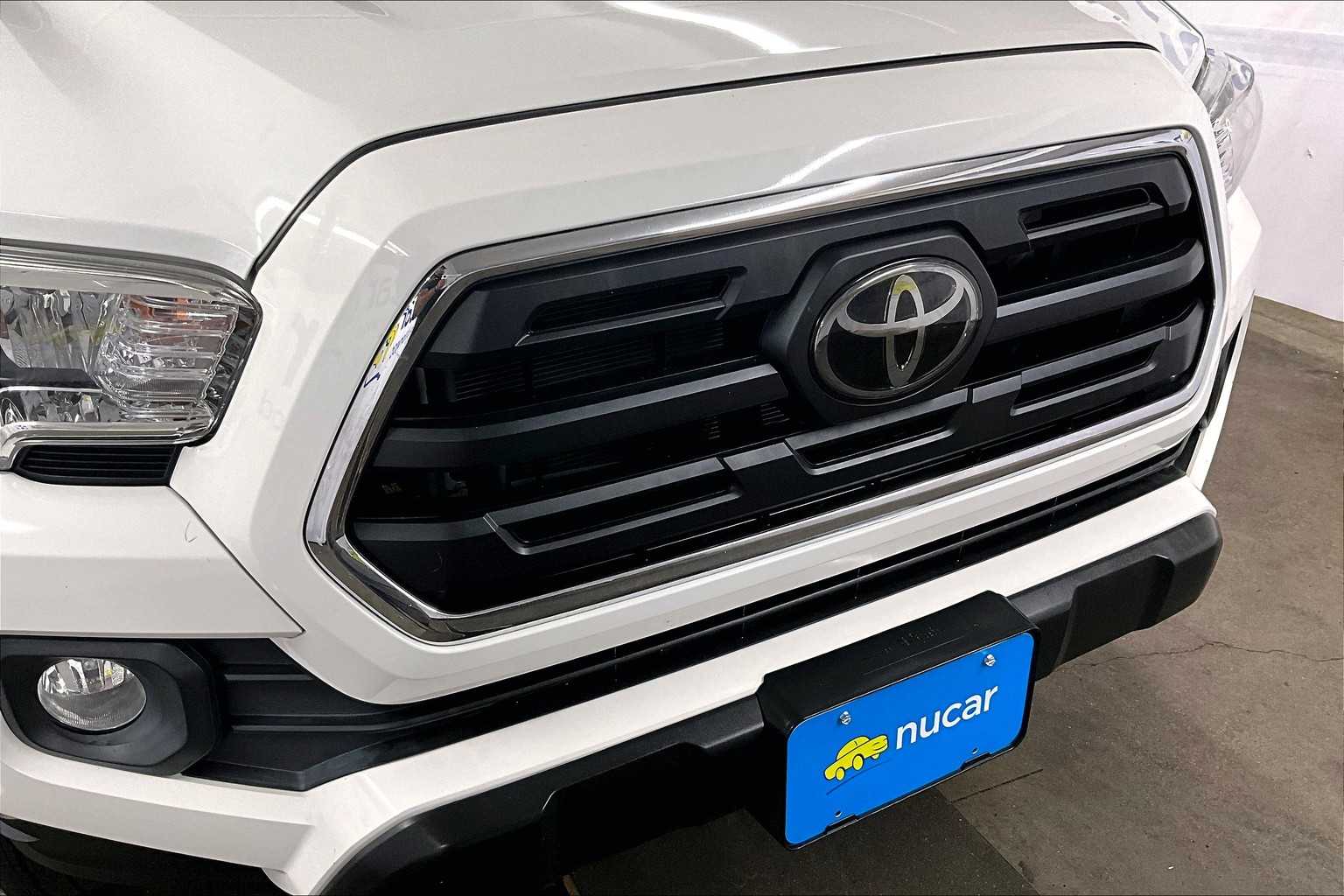 used 2018 Toyota Tacoma car, priced at $27,588