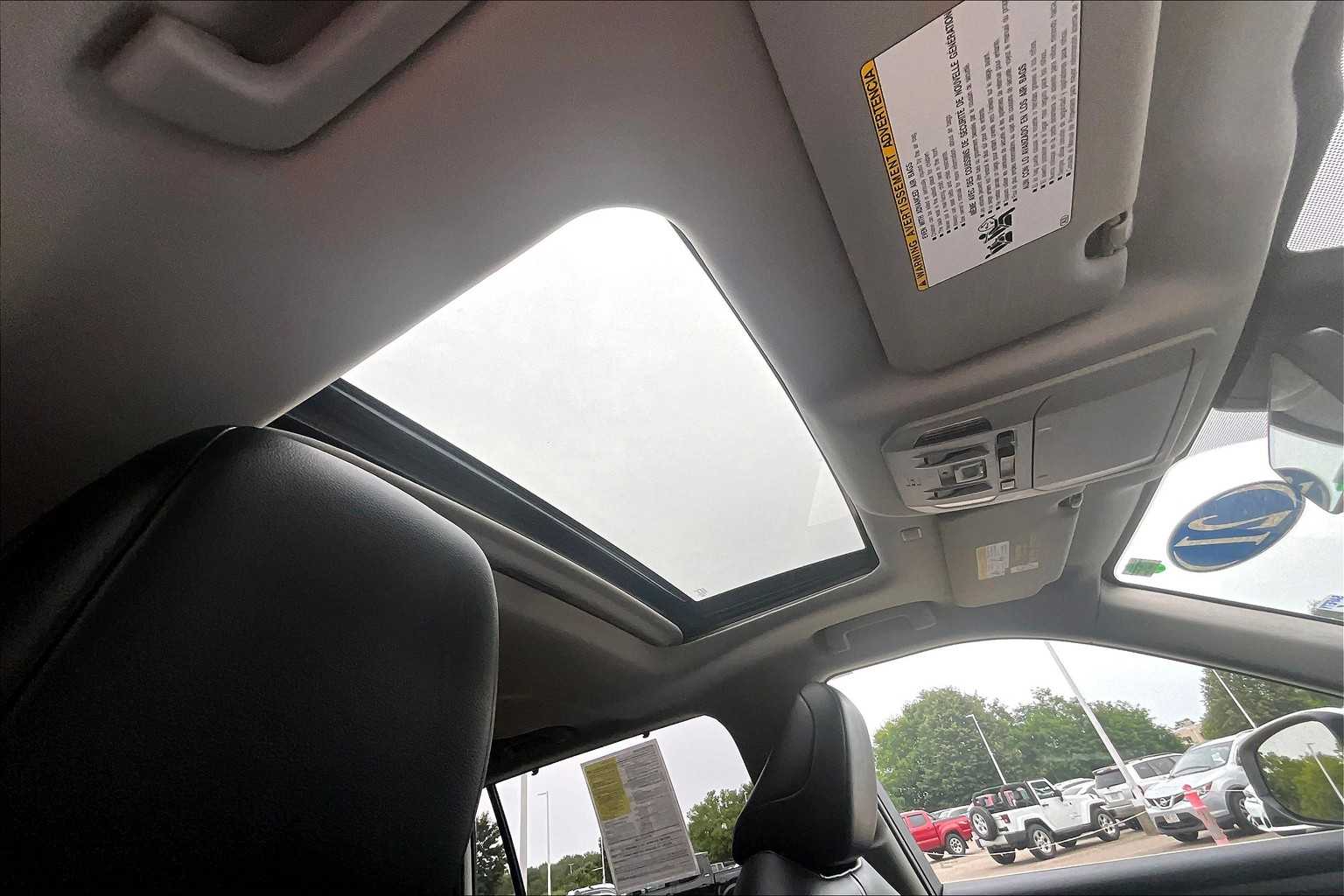 used 2021 Toyota Highlander car, priced at $29,488