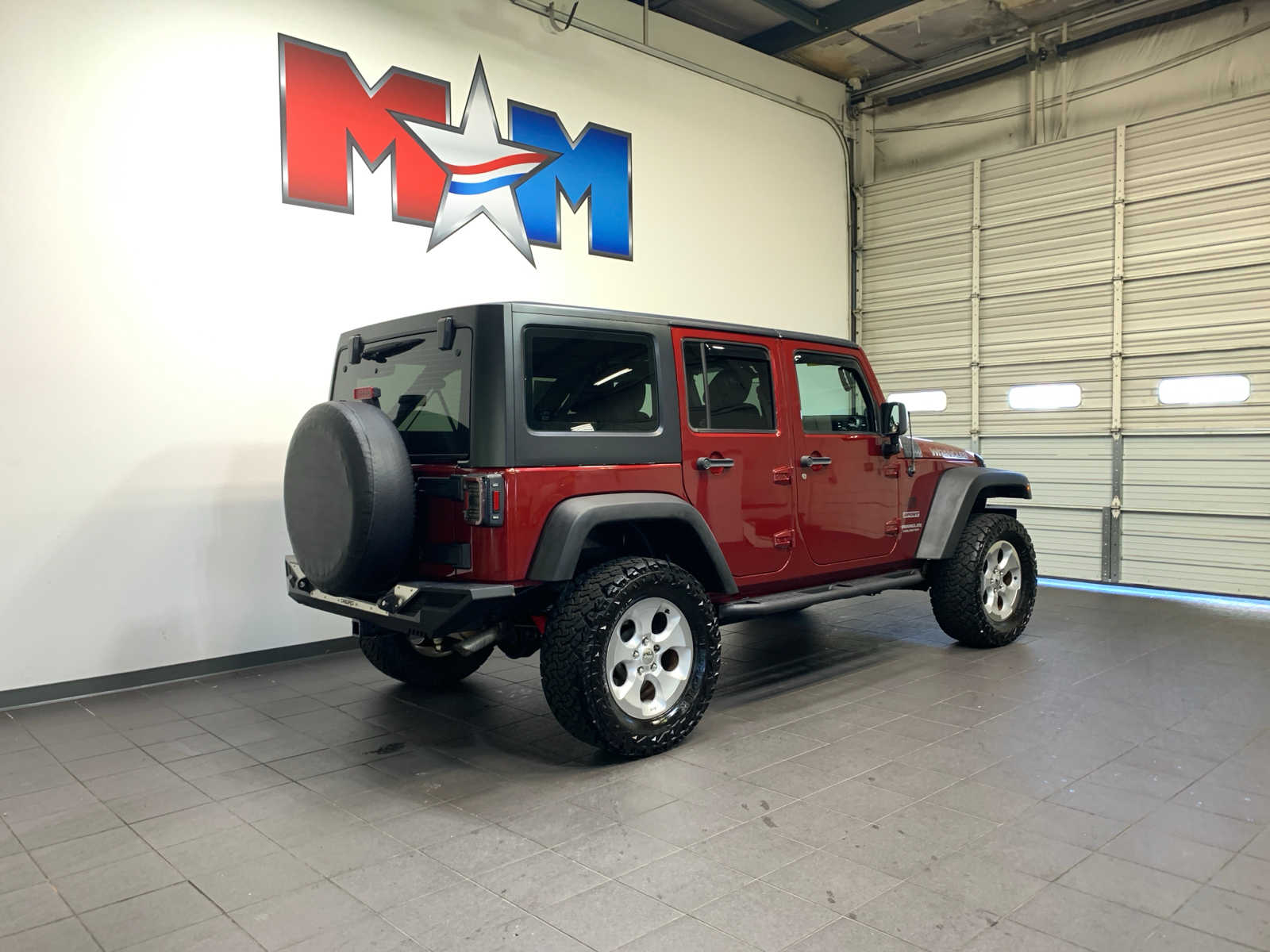 used 2012 Jeep Wrangler Unlimited car, priced at $15,989