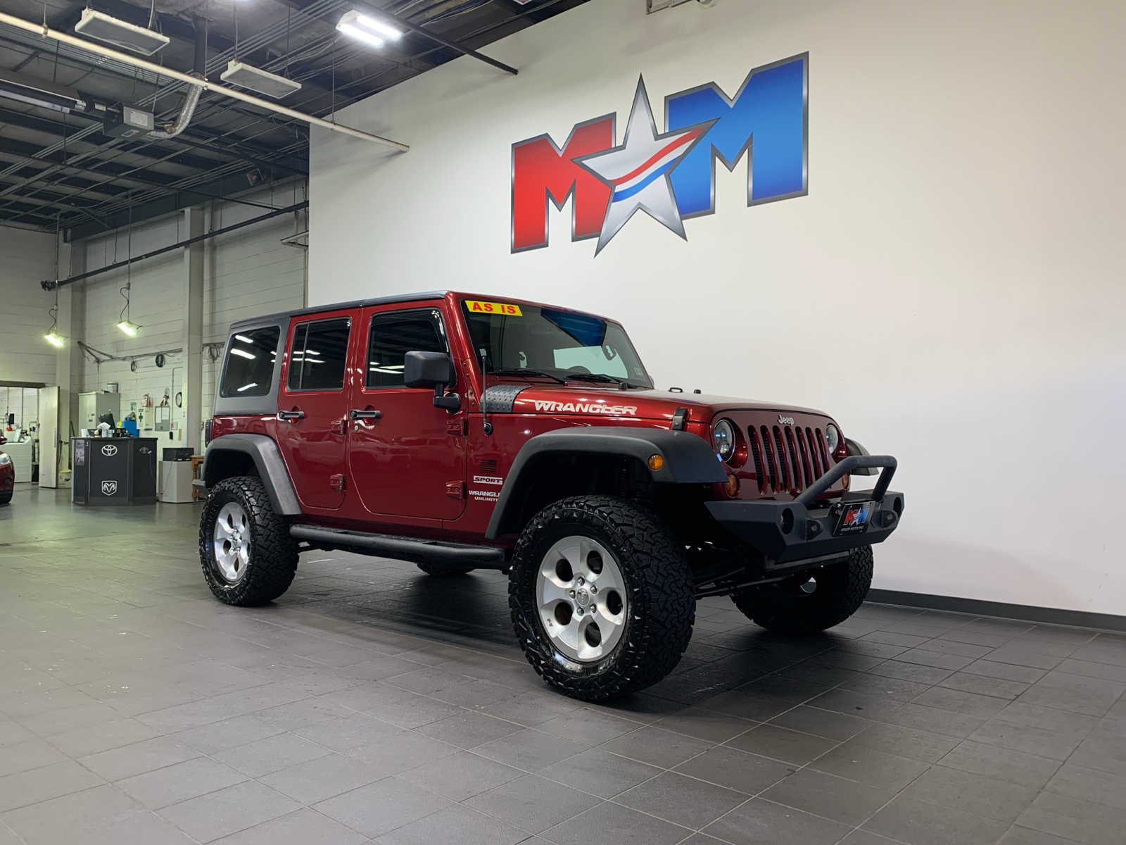 used 2012 Jeep Wrangler Unlimited car, priced at $15,989