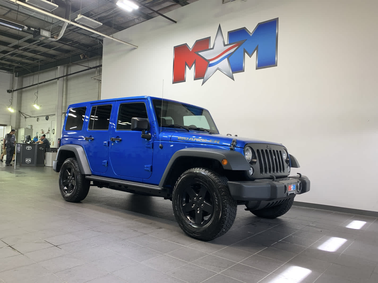 used 2016 Jeep Wrangler Unlimited car, priced at $25,988