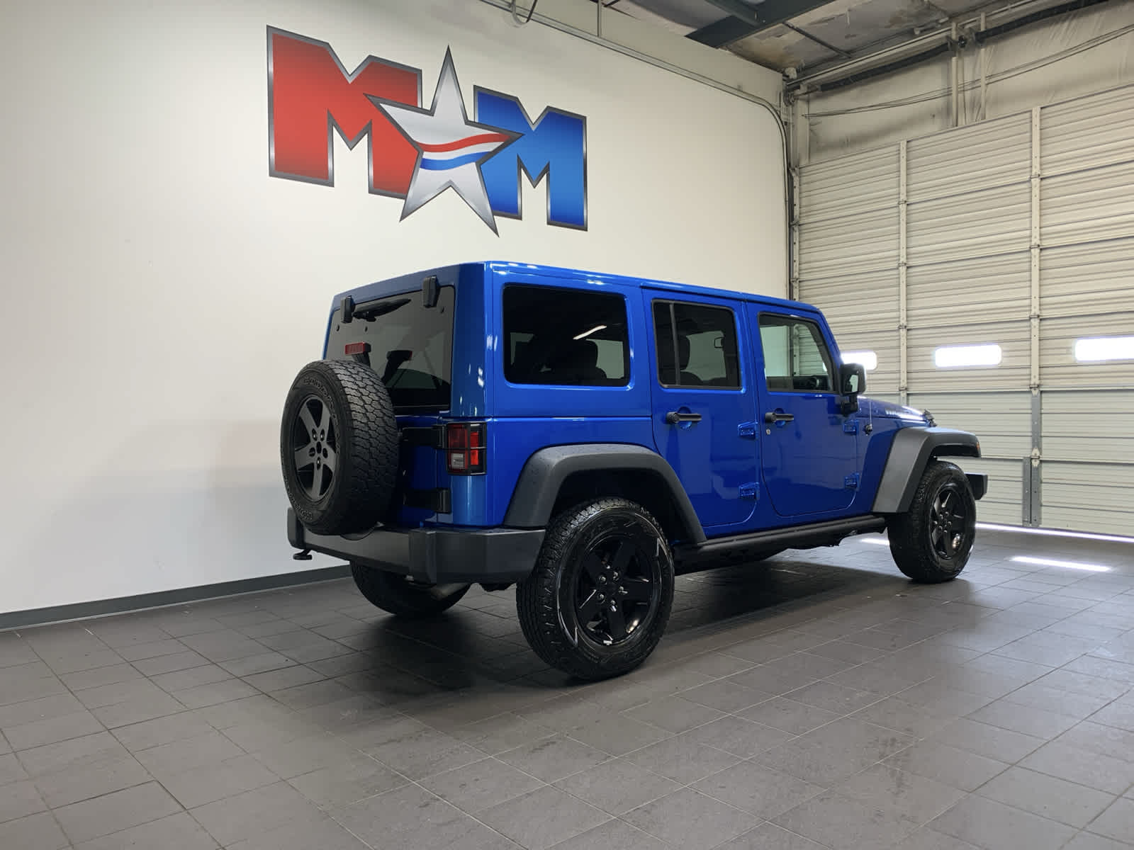 used 2016 Jeep Wrangler Unlimited car, priced at $27,945