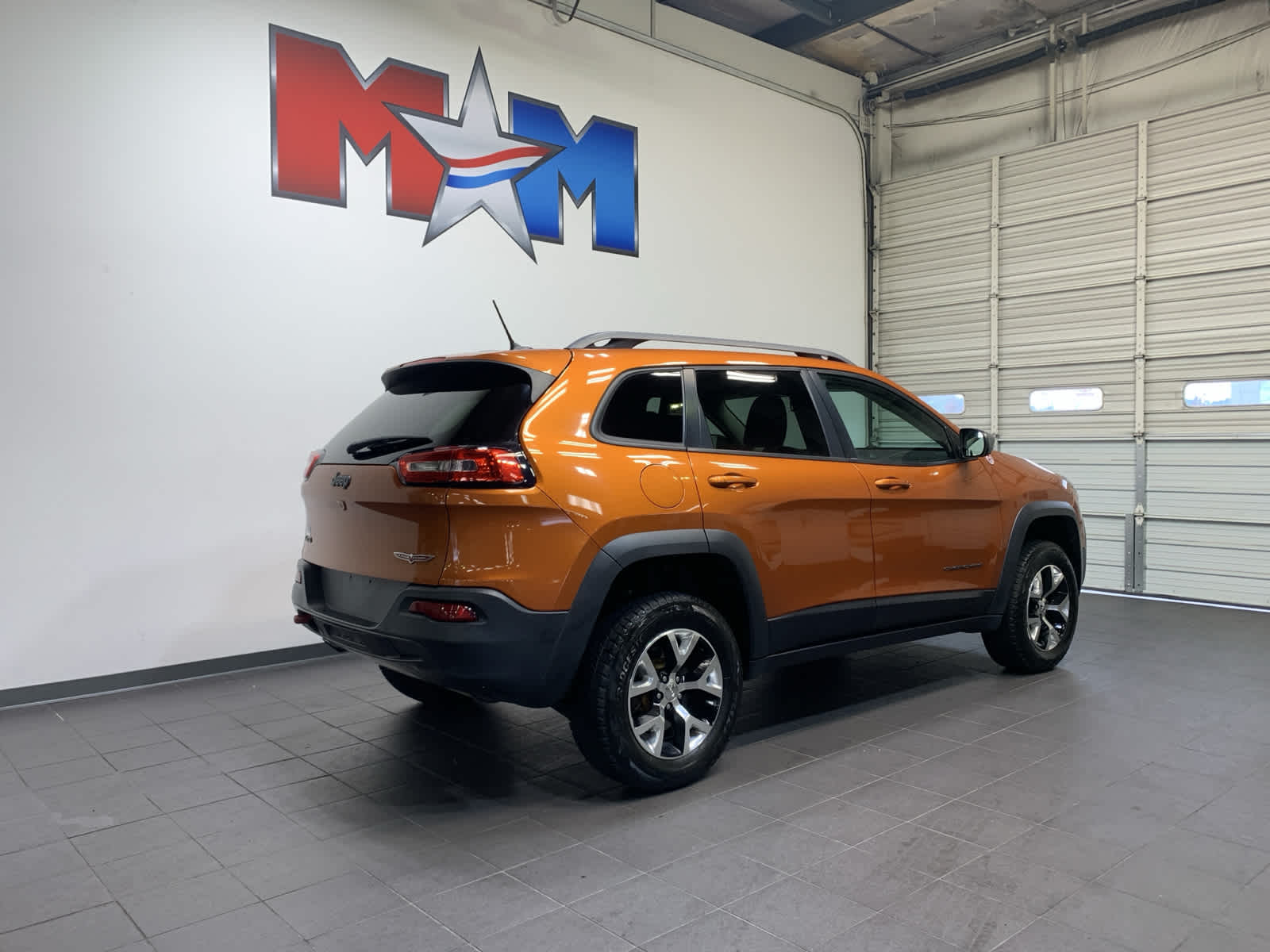 used 2015 Jeep Cherokee car, priced at $15,985