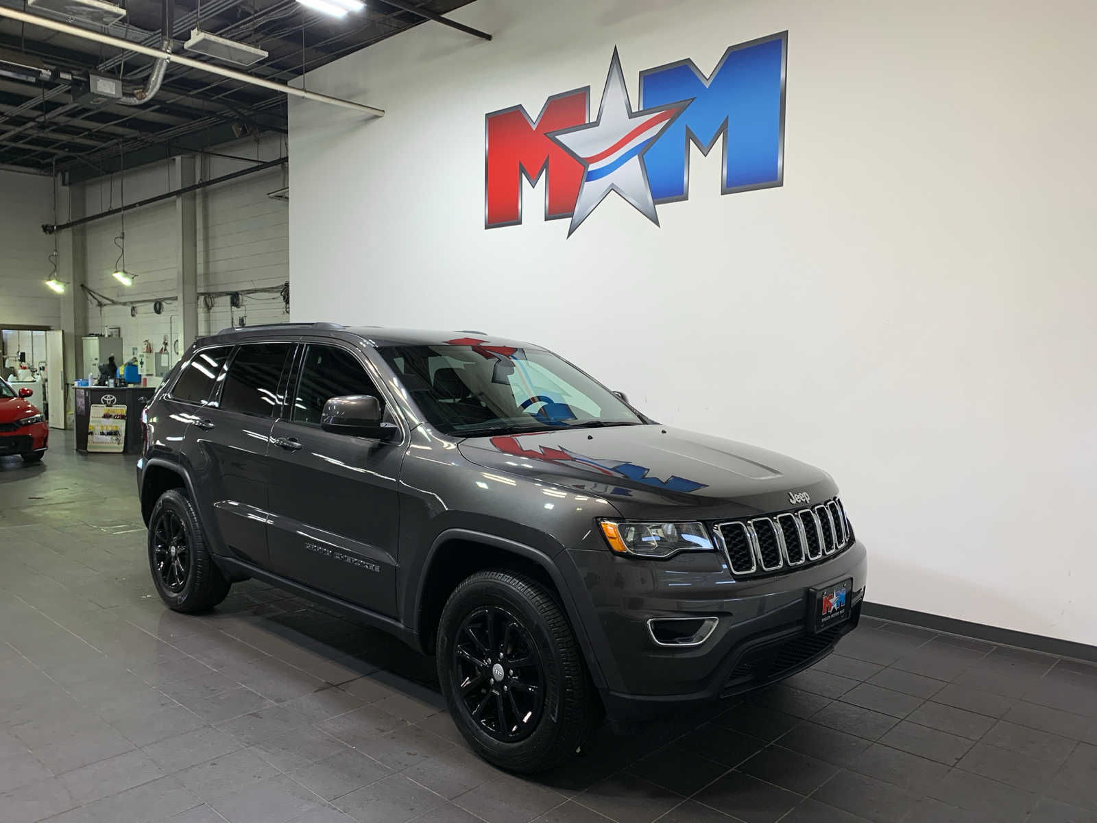 used 2021 Jeep Grand Cherokee car, priced at $32,889