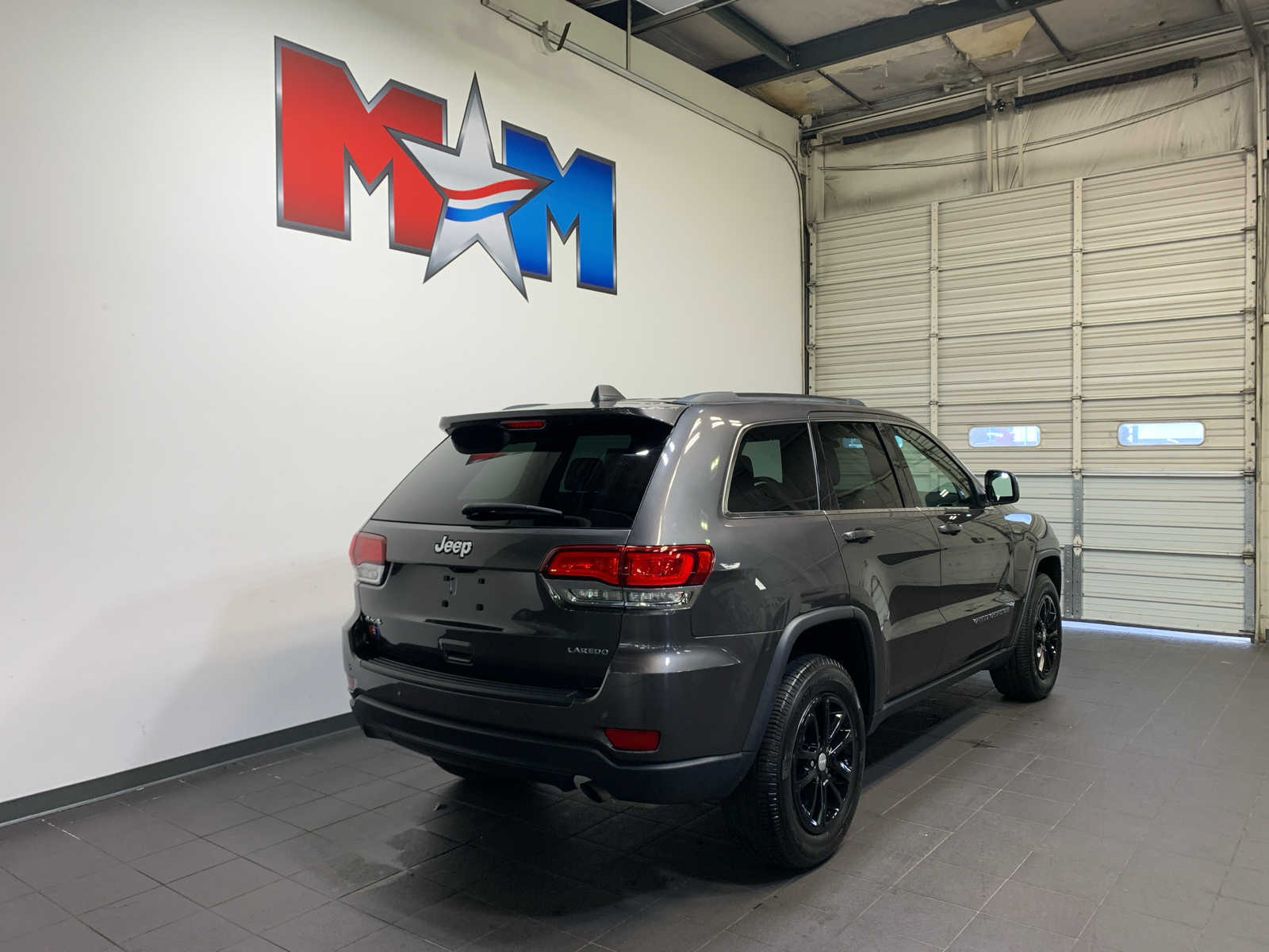 used 2021 Jeep Grand Cherokee car, priced at $32,889