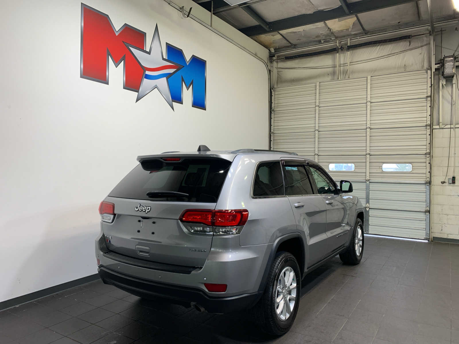 used 2021 Jeep Grand Cherokee car, priced at $28,389