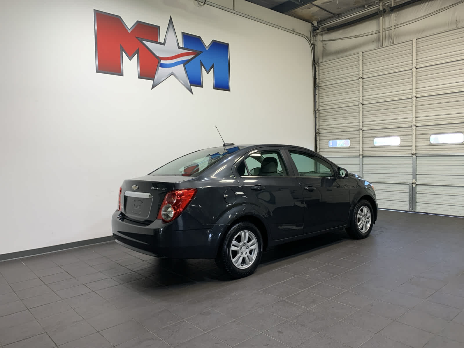 used 2015 Chevrolet Sonic car, priced at $12,489