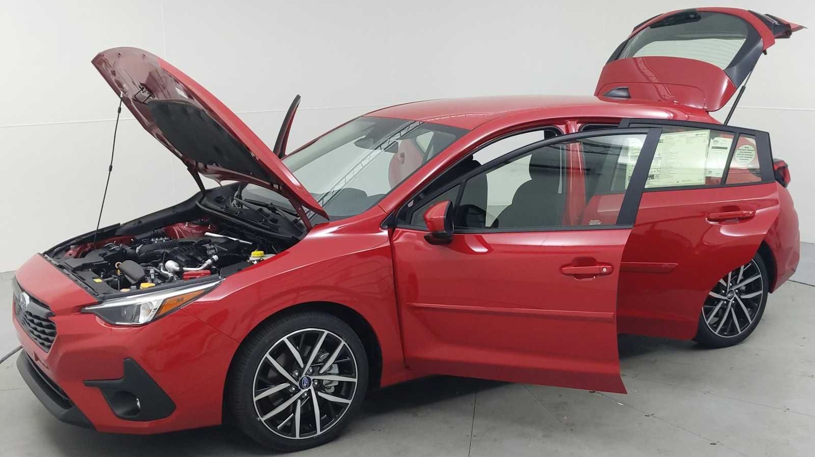 used 2024 Subaru Impreza car, priced at $24,916