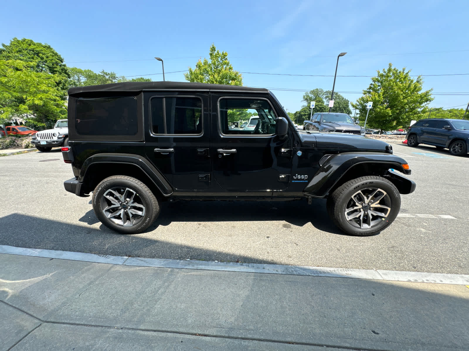 new 2024 Jeep Wrangler 4xe car, priced at $45,099