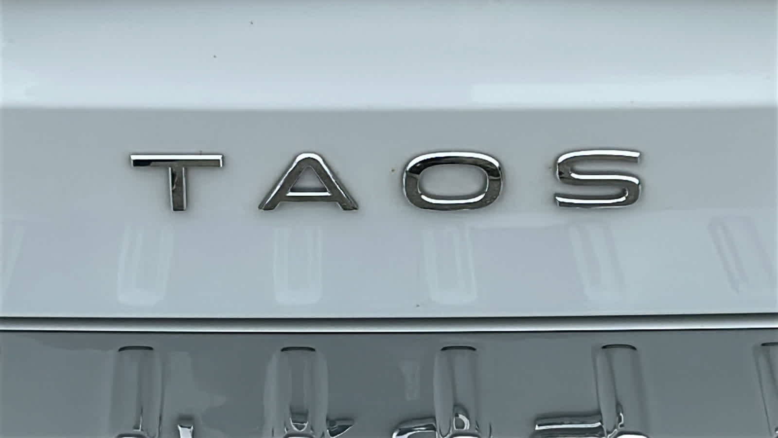 used 2023 Volkswagen Taos car, priced at $24,900