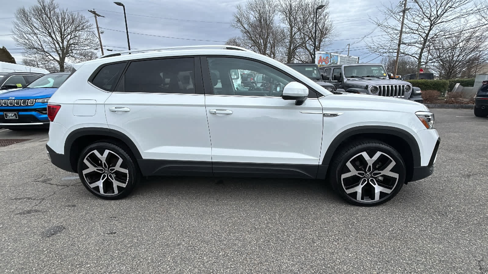used 2023 Volkswagen Taos car, priced at $24,900