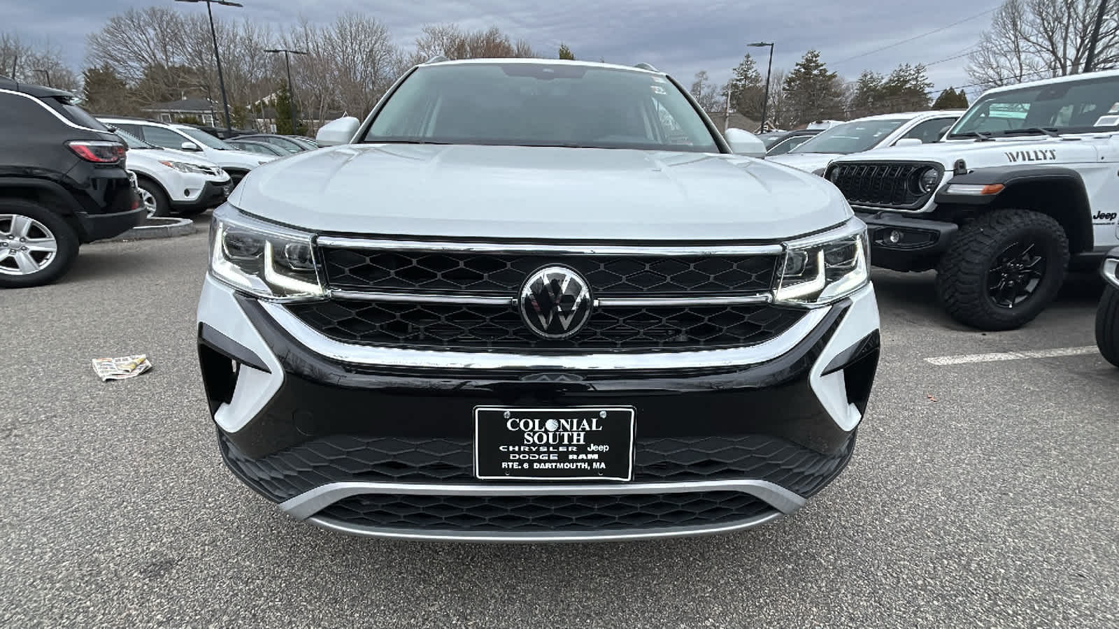 used 2023 Volkswagen Taos car, priced at $24,900
