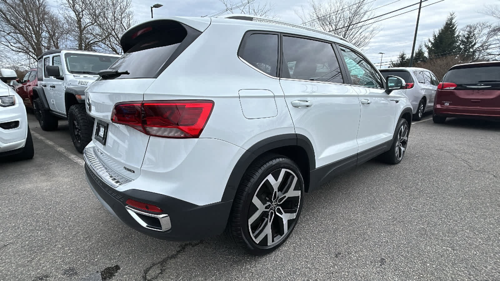 used 2023 Volkswagen Taos car, priced at $24,900