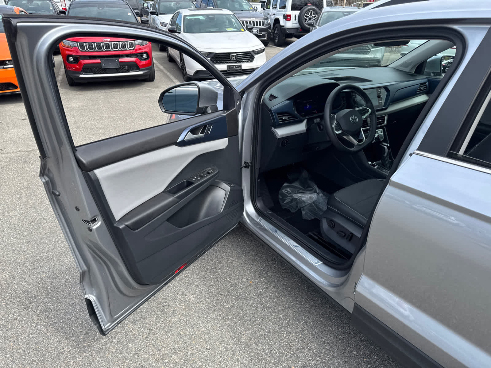 used 2023 Volkswagen Taos car, priced at $23,900