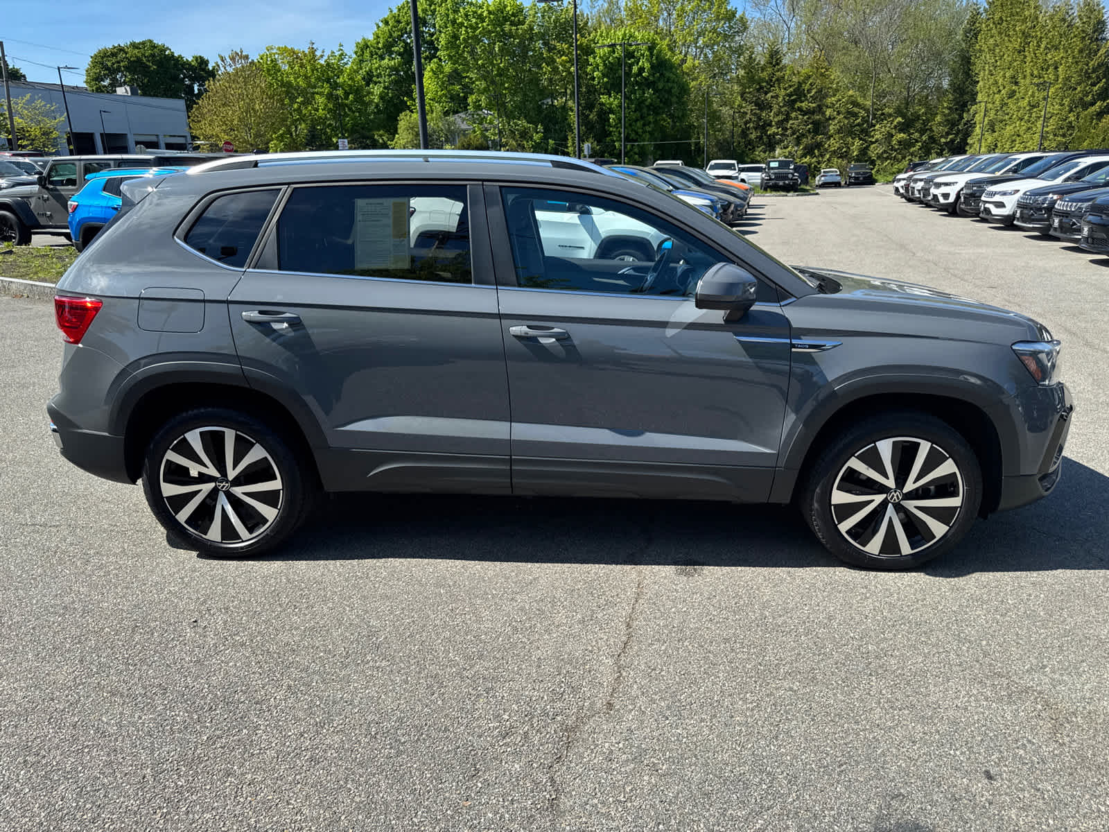 used 2022 Volkswagen Taos car, priced at $22,500