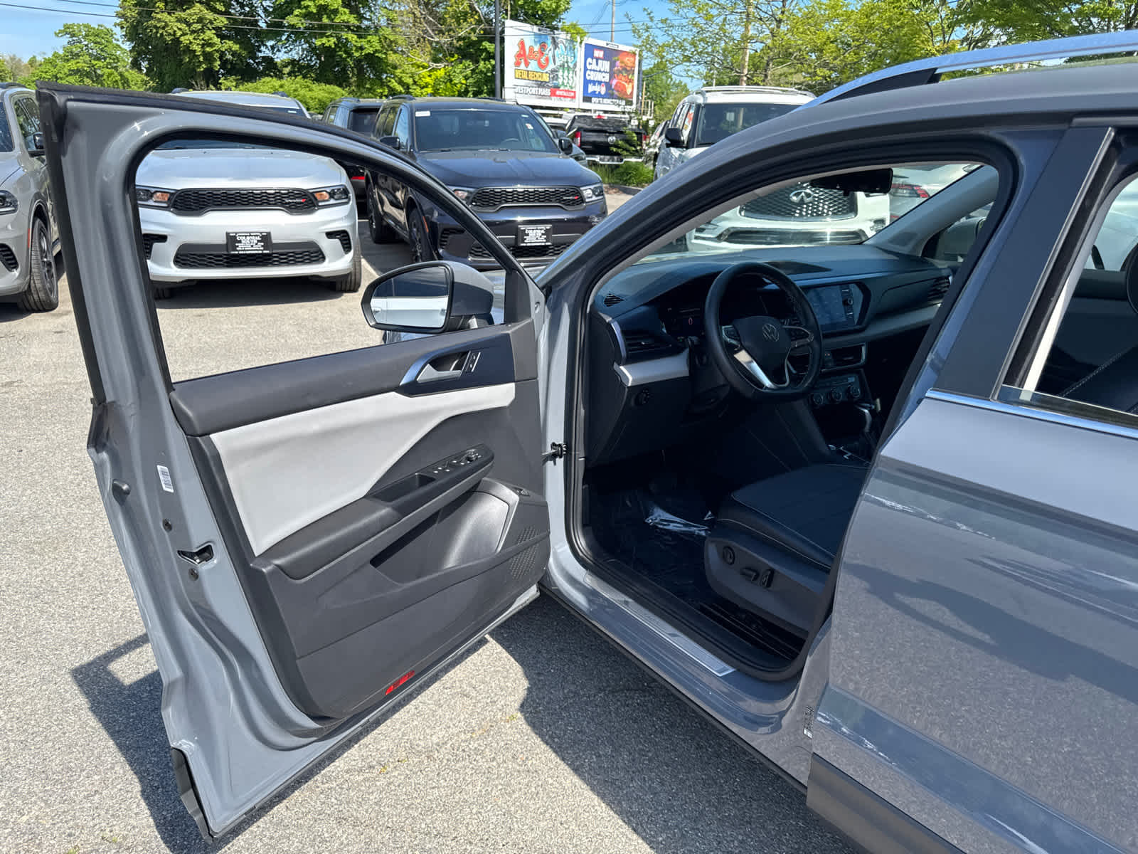 used 2022 Volkswagen Taos car, priced at $22,500