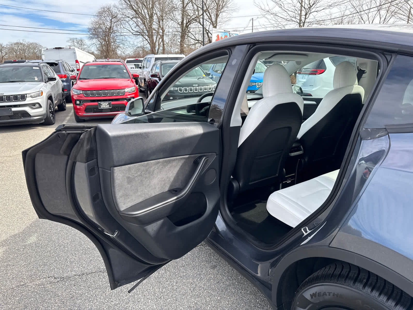 used 2023 Tesla Model Y car, priced at $35,700