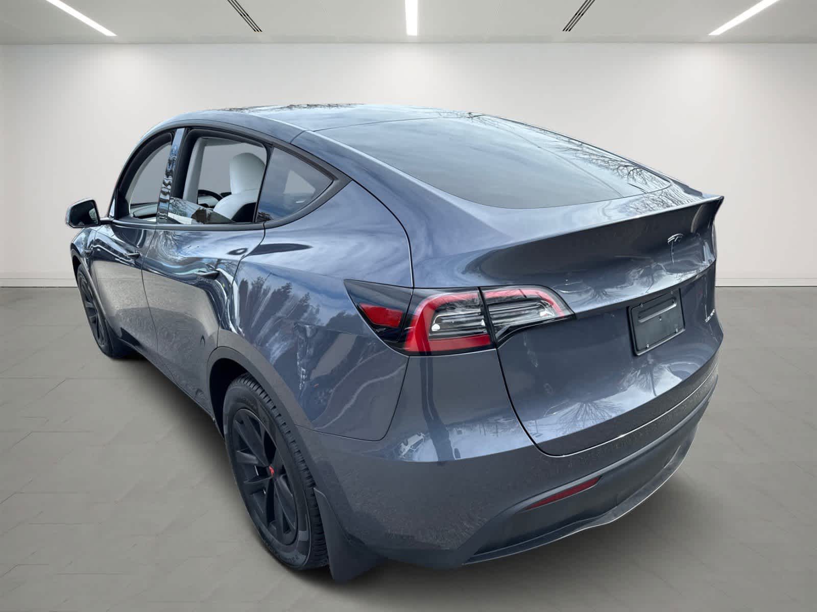 used 2023 Tesla Model Y car, priced at $35,700