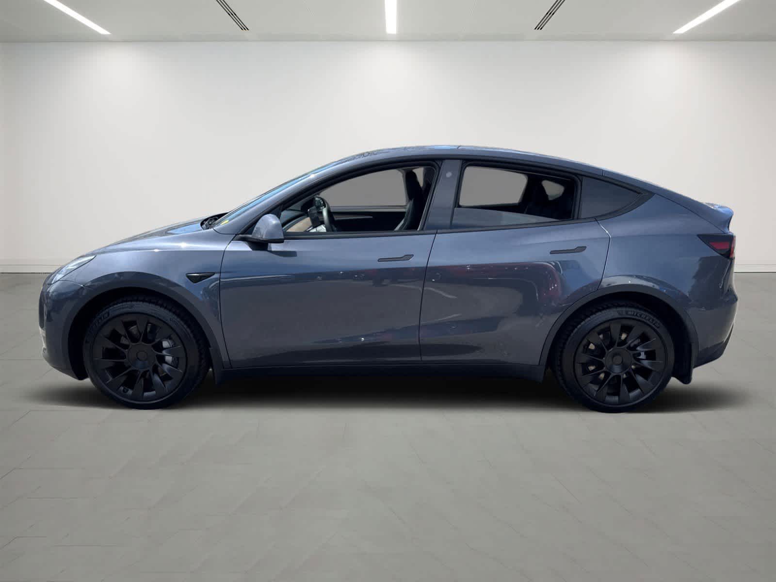 used 2023 Tesla Model Y car, priced at $29,400